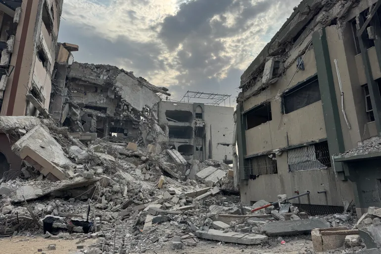Collapsed university buildings and rubble in Gaza