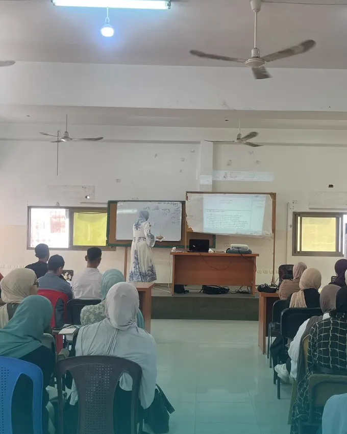 Students seated in a hall during a theory session of the clinical nutrition course